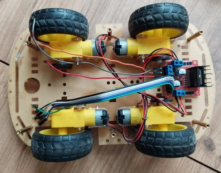 The 4WD platform mid-build with motors wired to the L298N driver